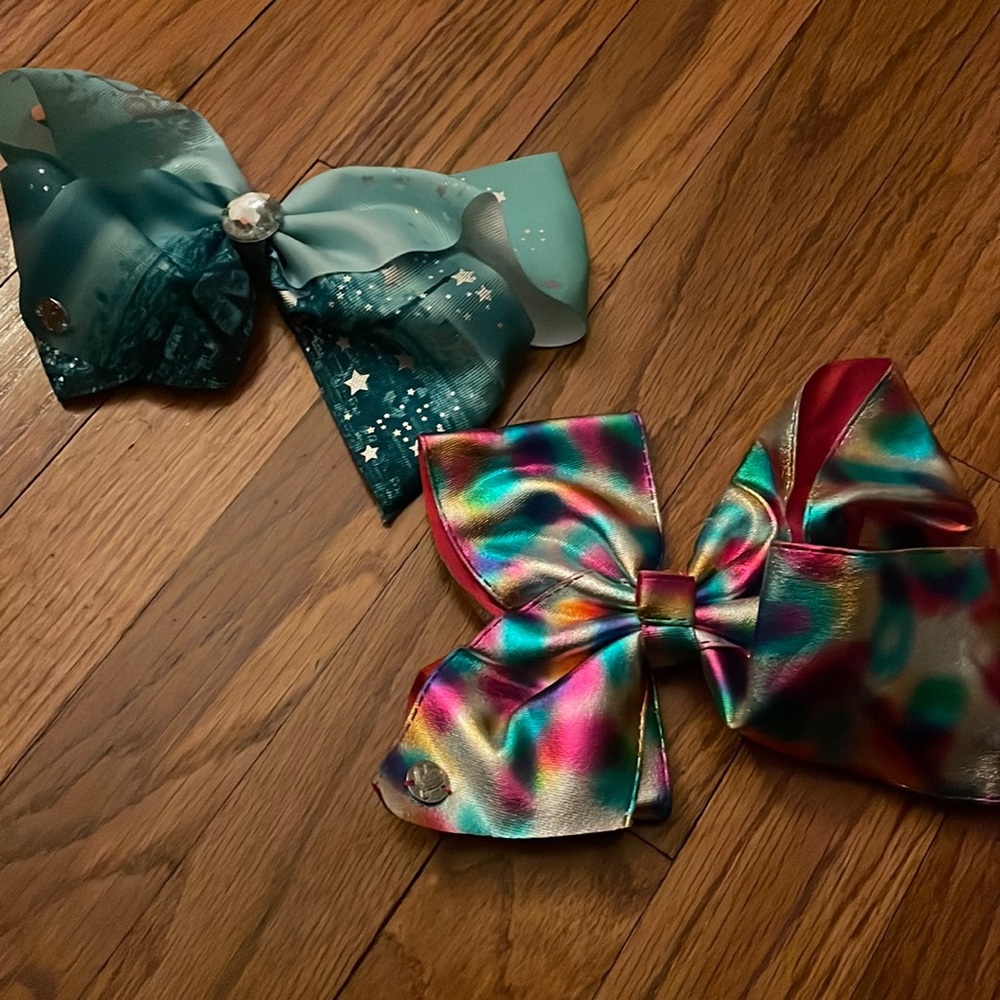 Blue Bow from Justice. Pink bow from Justice. worn once. JoJo Siwa bows.